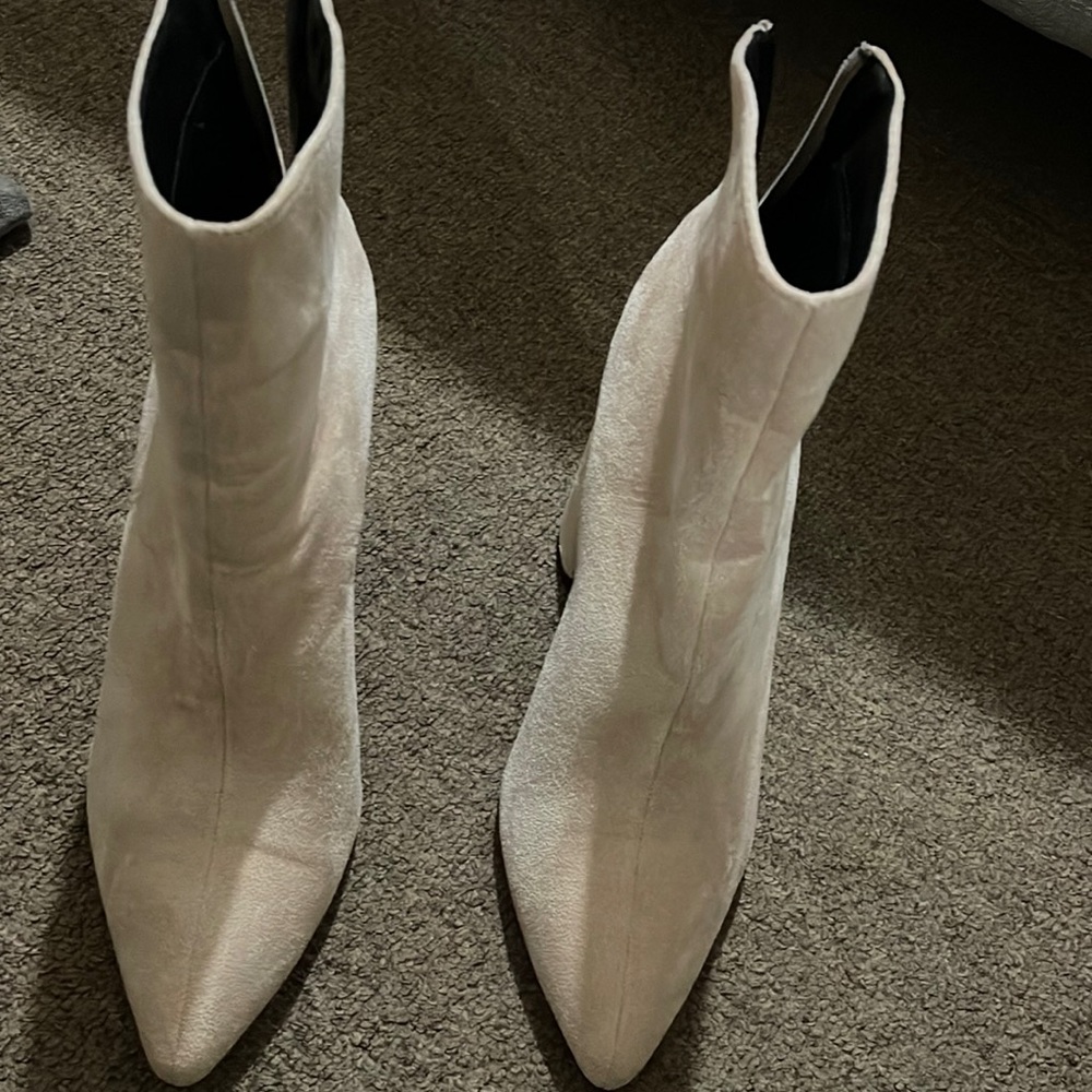 Super cute but comfy ankle bootie ! Never worn.
